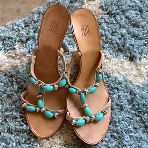 Worn several times. Rhinestone and turquoise.